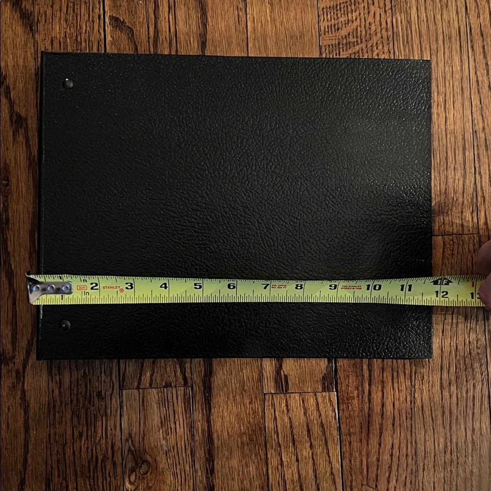 Black 3 Ring Textured Check Binder. Excellent condition.